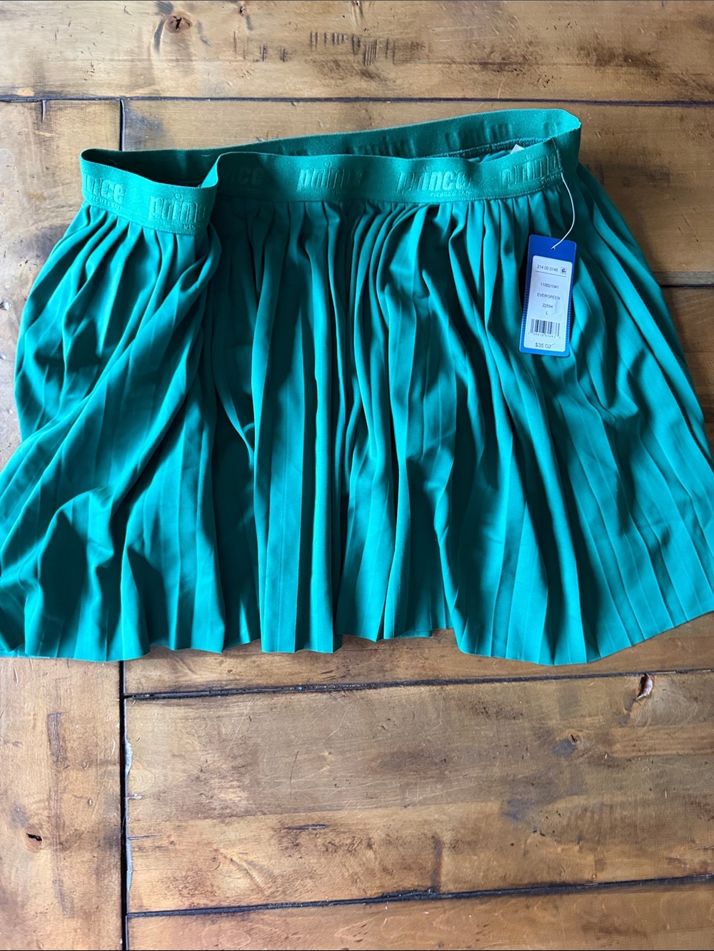 Prince pleated mini skirt in green